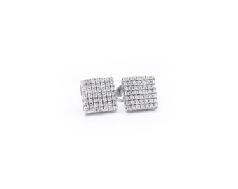 May include: A pair of silver square stud earrings with a pave setting of small, clear cubic zirconia stones.