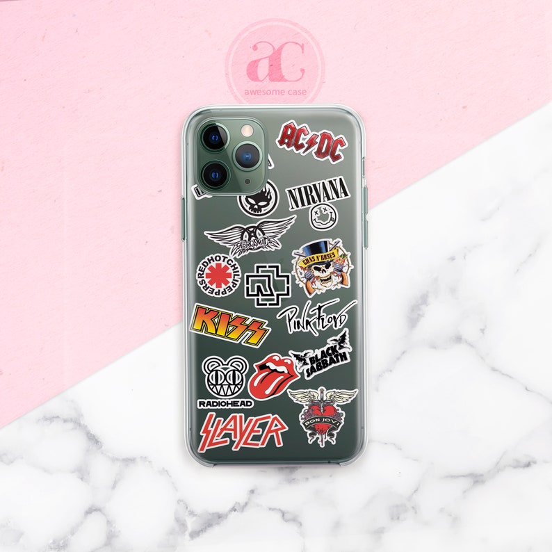 May include: A clear phone case with various band logos and names printed on it, including AC/DC, Nirvana, Red Hot Chili Peppers, KISS, Pink Floyd, Black Sabbath, Radiohead, Slayer, and Bon Jovi.