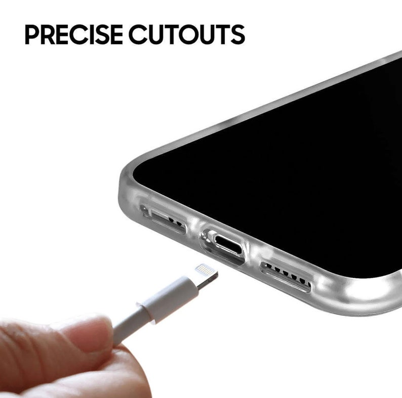May include: A clear phone case with precise cutouts for the charging port and speakers. A white charging cable is plugged into the phone case.