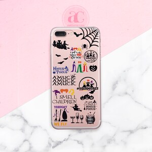 May include: A clear phone case with a variety of Halloween-themed graphics, including witches, bats, pumpkins, and the text "Hocus Pocus", "I smell children", "We fly", and "#SquadGoals".