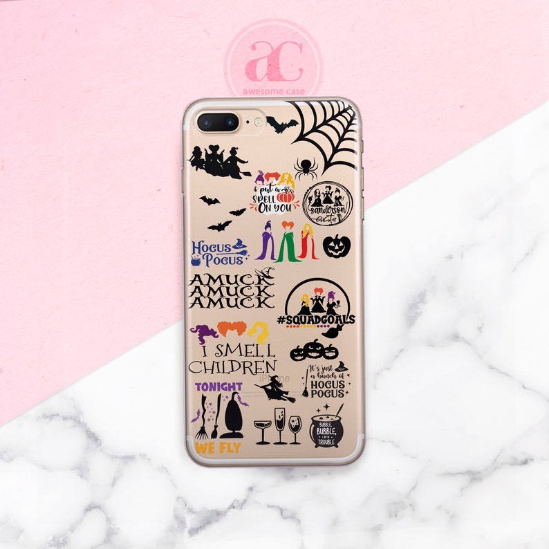 May include: A clear phone case with a gold trim and a variety of Hocus Pocus themed stickers. The stickers include the Sanderson sisters, a pumpkin, bats, a spider web, and text that says "I smell children", "Hocus Pocus", "Amuck", "We Fly", "Bubble Trouble", and "Squad Goals".