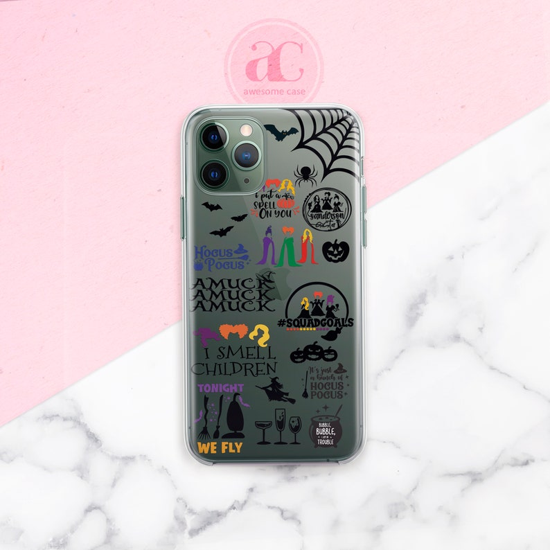 May include: A clear phone case with a black and green design featuring various Hocus Pocus quotes and images, including witches, pumpkins, and bats. The text includes "I put a spell on you", "Hocus Pocus", "Amuck", "I smell children", "We fly", and "#SquadGoals".