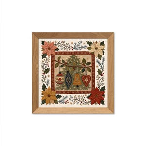 May include: A square framed embroidery featuring a central Christmas tree with hanging ornaments including a round bauble, a blue teardrop, a gold bell, and a red heart, surrounded by a border of poinsettia flowers and pine branches.