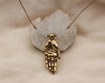 Hand pendant moonstone pure golden brass healing stone moon cycle feminine somatic jewelry for body workers and artists