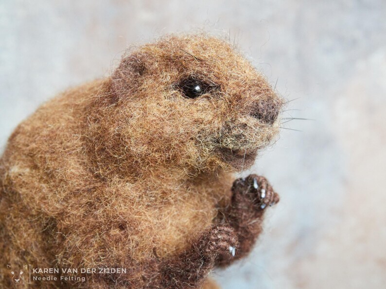 Realistic needle felted beaver sculpture, measuring just over 5 3/4 inches tall.