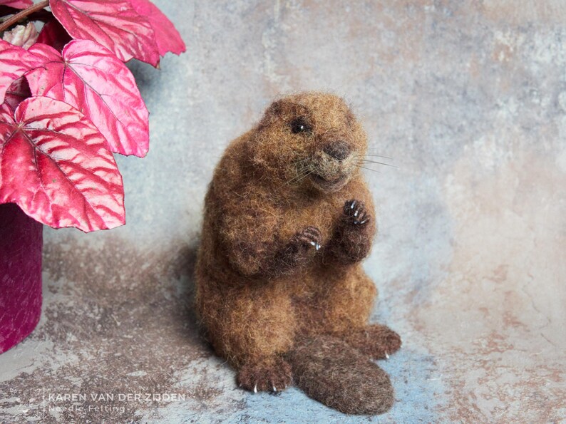 Realistic needle felted beaver sculpture, measuring just over 5 3/4 inches tall.