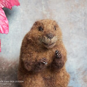 Realistic needle felted beaver sculpture, measuring just over 5 3/4 inches tall.