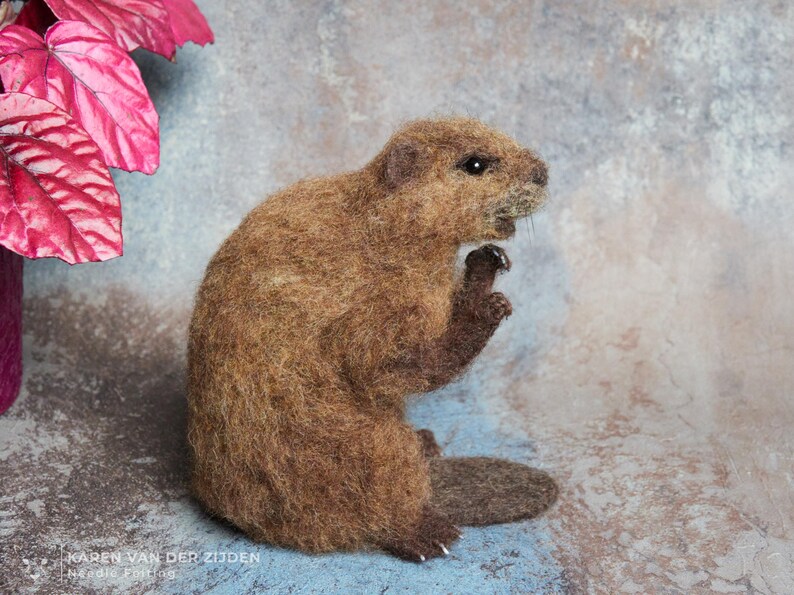 Realistic needle felted beaver sculpture, measuring just over 5 3/4 inches tall.