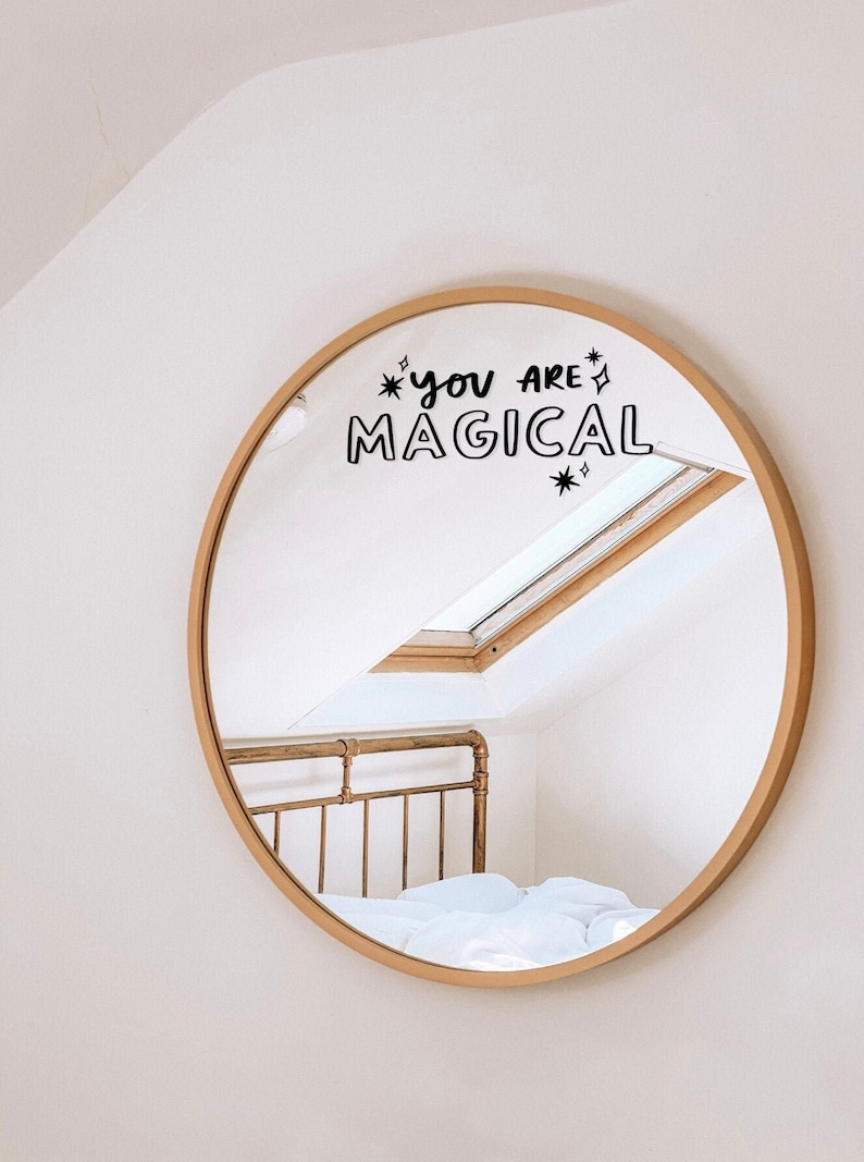 Vinyl mirror decal sticker motivational gift and proud of you gift home décor that reads "You are magical" in black typography surrounded with star illustrations