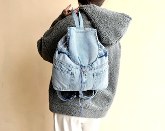 Recycled light blue denim backpack/Vintage  worn-out denim backpack/Jeans drawstring backpack