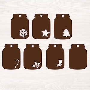 May include: Eight brown mason jar-shaped gift tags with various Christmas-themed designs, including a snowflake, star, Christmas tree, candy cane, holly, and stocking.