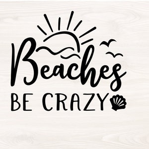 May include: Black graphic design on a light wood background. The design includes the words "Beaches BE CRAZY" with a sun, waves, birds, and a seashell. The text is in a bold, playful font.