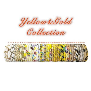 Handmade yellow and gold beaded bracelet collection featuring unique floral, geometric and abstract designs. Stylish, stackable, gift ready