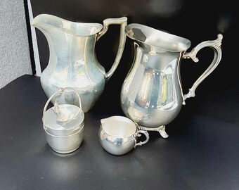 Mixed lot teapot set, silver plate pitchers, sugar bowl and creamer/ silver plate large teapot tea pitchers set of 4, E.P.C Poole Silver