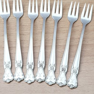 7 Old Community Plate Cocktail Forks, 