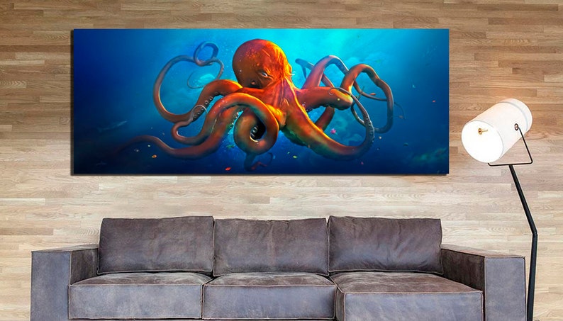 May include: A vibrant orange octopus with long tentacles swims in a blue ocean. The octopus is surrounded by small fish and coral.