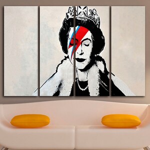May include: A black and white portrait of Queen Elizabeth II with a red, blue, and white lightning bolt painted over her right eye. The portrait is split into three panels.