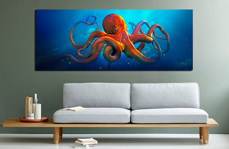 May include: A large, orange octopus with long tentacles swims in a blue ocean. The octopus is in the center of the image, with its tentacles spread out around it. The ocean is a deep blue, and there are small fish swimming around the octopus.