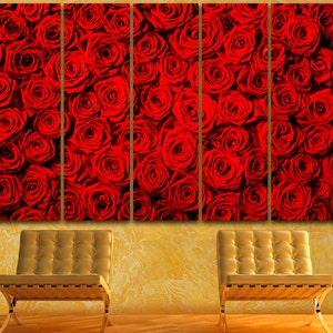 May include: A close-up of a wall art print featuring a vibrant red rose pattern. The print is divided into five panels, creating a multi-panel effect.