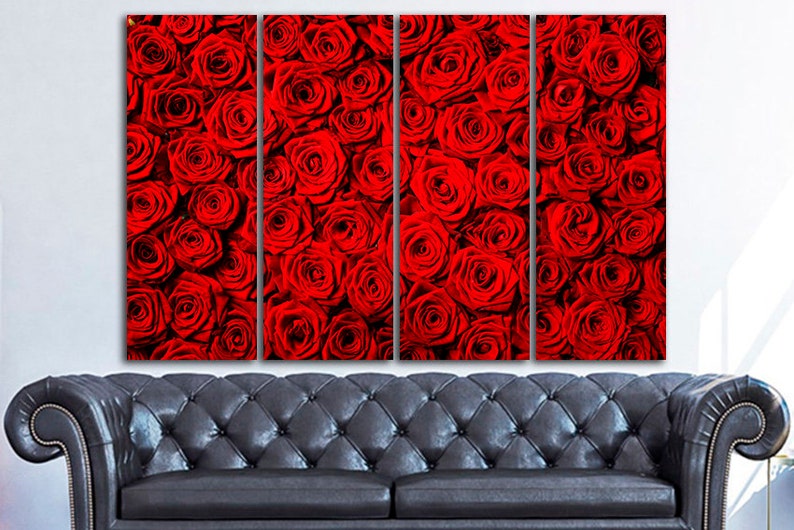 May include: A close-up of a wall art print featuring a red rose pattern. The print is divided into four panels, each showing a different section of the rose pattern.