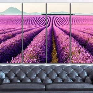 May include: A multi-panel canvas print featuring a field of purple lavender flowers in rows, with a distant mountain range in the background.