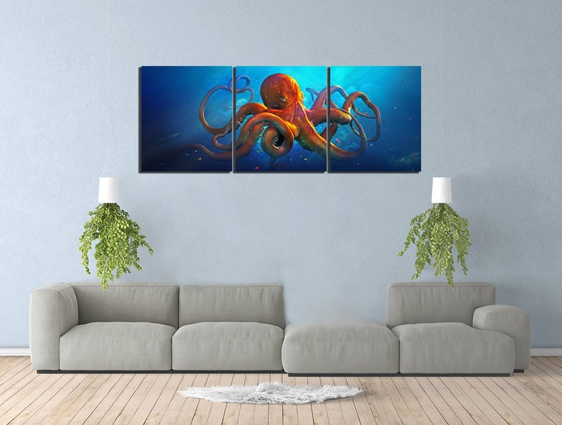 May include: A three-panel canvas print featuring a vibrant orange octopus with tentacles outstretched against a blue background. The octopus appears to be swimming in the ocean.
