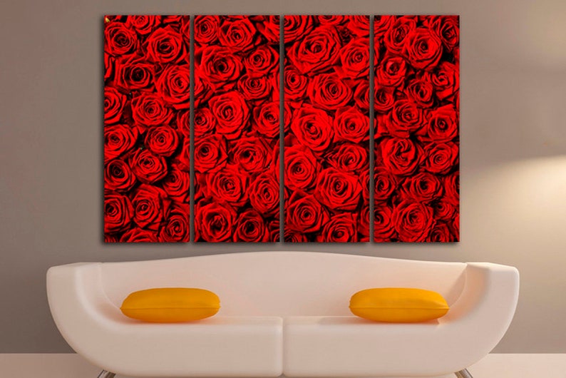 May include: A close-up image of a wall art print featuring a red rose pattern. The print is divided into four panels, each showing a different section of the rose pattern.