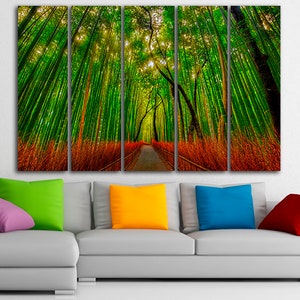 May include: A five-panel canvas print depicting a path through a lush green bamboo forest. The path is lined with tall, slender bamboo stalks, and the sunlight filters through the leaves, creating a dappled effect.