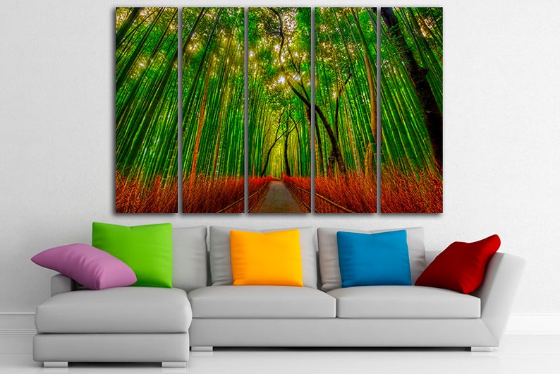 May include: A five-panel canvas print depicting a path through a lush green bamboo forest. The path is lined with tall, slender bamboo stalks, and the sunlight filters through the leaves, creating a dappled effect.