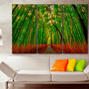 May include: A three-panel canvas print depicting a path through a lush green bamboo forest. The path is lined with tall bamboo stalks and the sunlight filters through the leaves, creating a dappled effect.