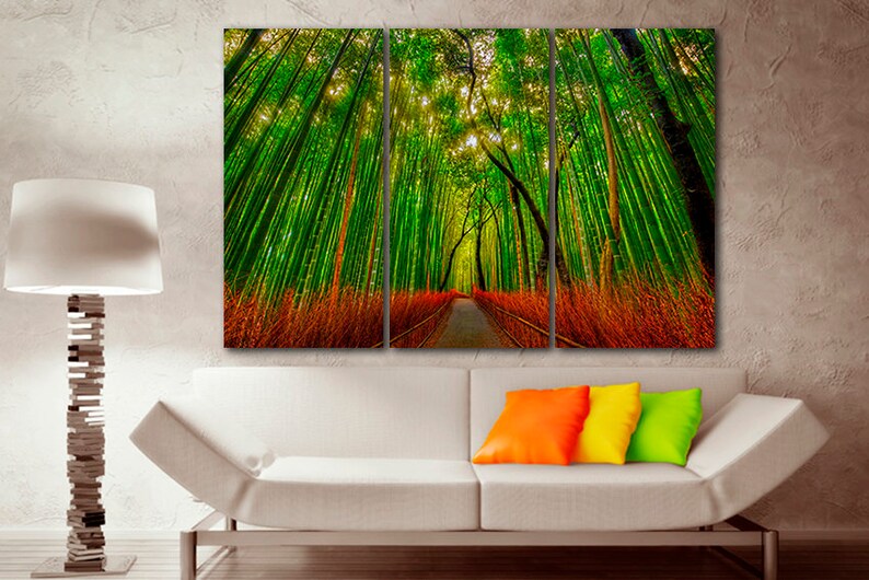 May include: A three-panel canvas print depicting a path through a lush green bamboo forest. The path is lined with tall bamboo stalks and the sunlight filters through the leaves, creating a dappled effect.