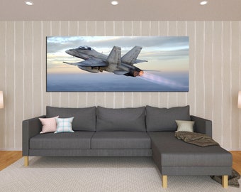 May include: A grey fighter jet flying through the clouds with smoke trailing from its engines.