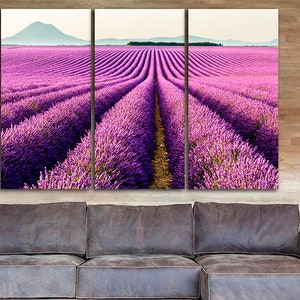 May include: A three-panel canvas print featuring a field of purple lavender flowers in rows, with a distant mountain range in the background.