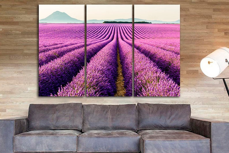 May include: A three-panel canvas print featuring a field of purple lavender flowers in rows, with a distant mountain range in the background.