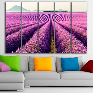 May include: A multi-panel canvas print featuring a field of purple lavender flowers in rows, with a distant mountain range in the background.