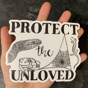 Larger “protect the unloved” all weather sticker