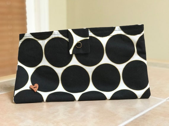 black and white polka dot clutch bag