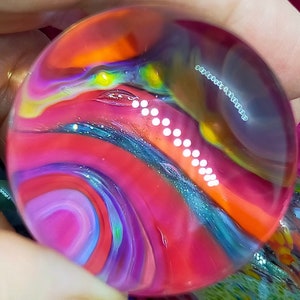 Psychadelic Glass Marble, Handmade in Australia, fushia pinks, blues and oranges, lots of sparkles and tones of silver!