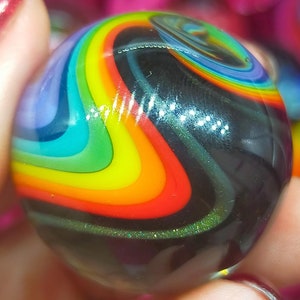 Rainbow glass marble, handmade from borosilicate glass with strips of sparkle glass!
