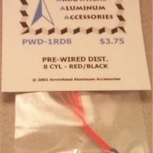 May include: A package containing a pre-wired distributor for an 8-cylinder engine. The distributor has red and black wires and is labeled "PWD-1RD8" and "$3.75".