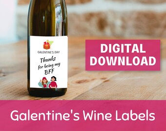Może przedstawiać: Drukowana etykieta na butelkę wina z ilustracją czerwono-białego pudełka prezentowego i tekstem "Galentine's Day Thanks for being my BFF". Na obrazku widoczne są dwie kreskówkowe kobiety.