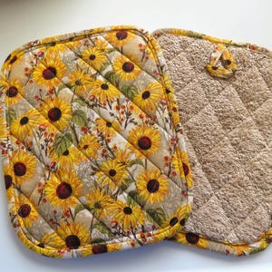 Sunflower potholders on brown - set of 2