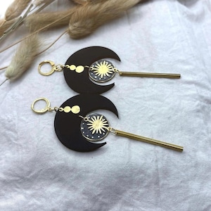 Celestial earrings. Moons, inner tube and painted brass.