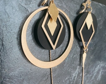 Asymmetrical earrings made from recycled inner tube