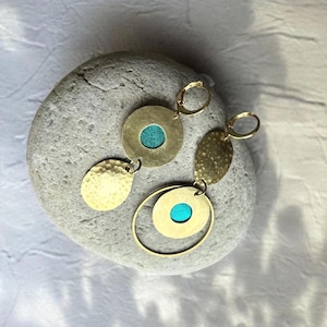 Asymmetrical turquoise, brass and recycled inner tube earrings.
