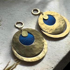 Hammered brass hoop earrings.
