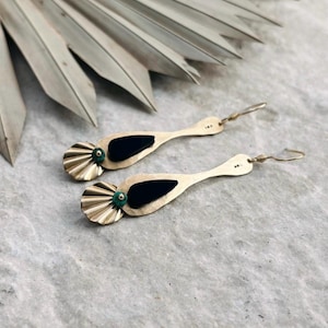 Brass and turquoise earrings, recycled inner tube.