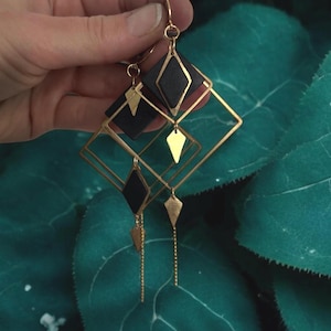 Asymmetrical earrings made of brass and recycled inner tube. Geometric earrings.