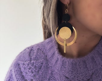 Asymmetrical Full Moon earrings made from recycled inner tube