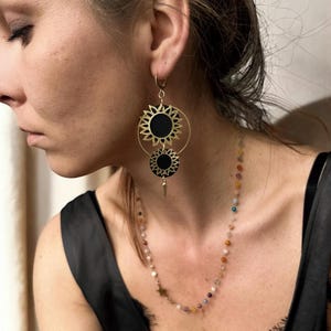 Sunflowers, Asymmetrical earrings made from recycled inner tubes and brass. Ethnic and bohemian earrings.